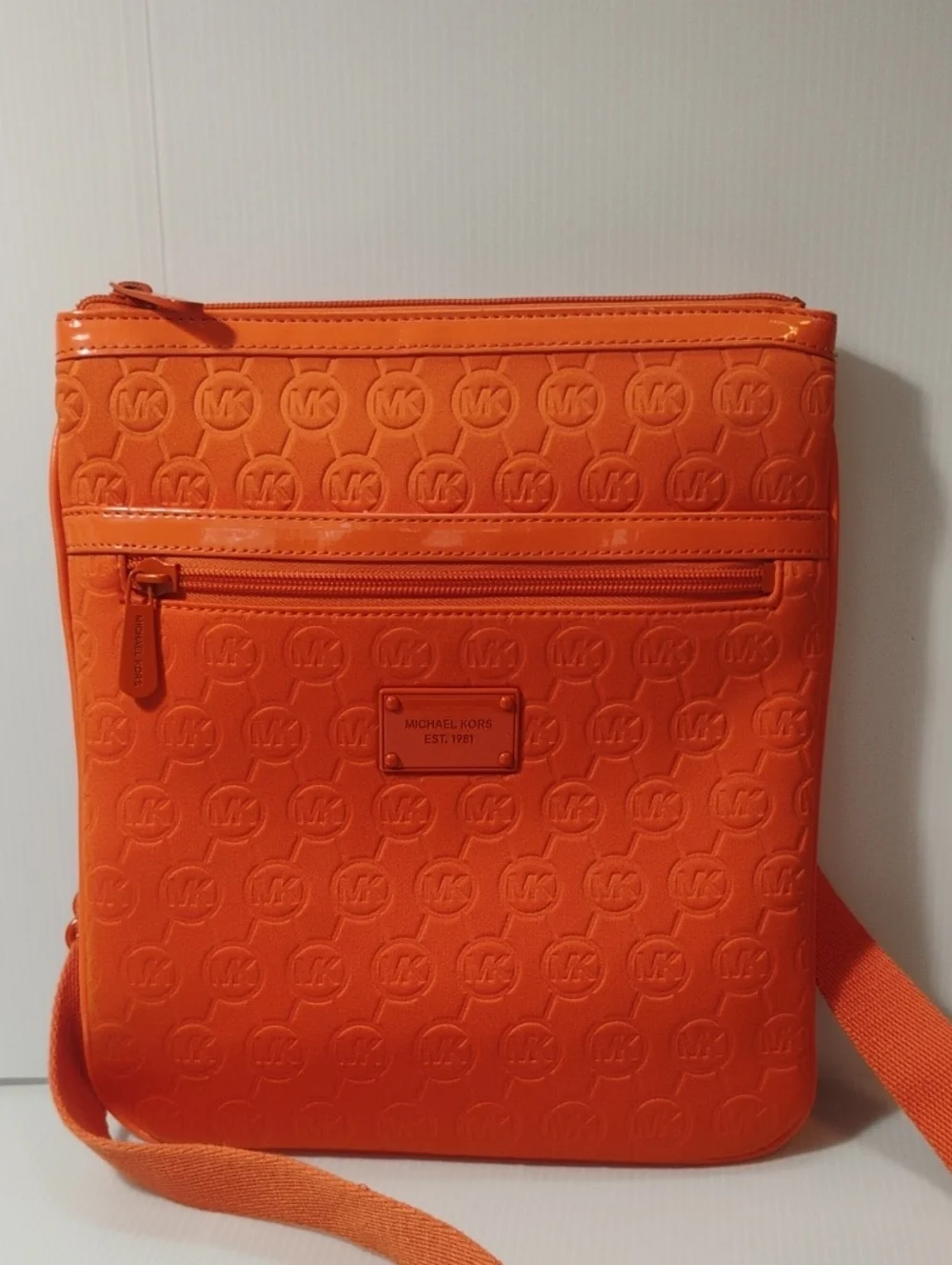 Michael Kors Neoprene Tangerine Mono Embossed Swing Crossbody bag